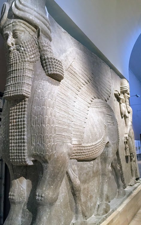 Ancient Assyrian Gate Reliefs With Winged Genies