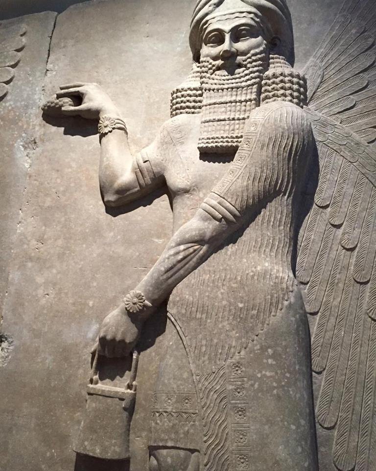 Ancient Assyrian Gate Reliefs With Winged Genies