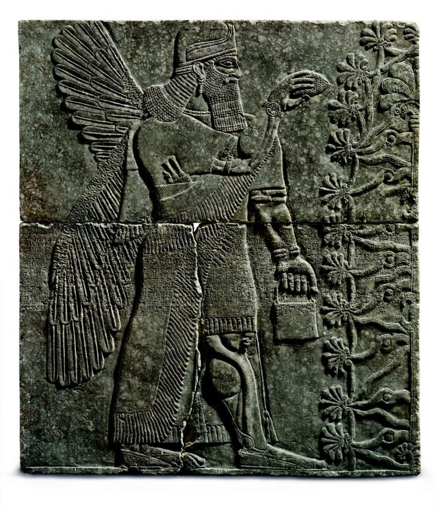 Ancient Assyrian Gate Reliefs With Winged Genies