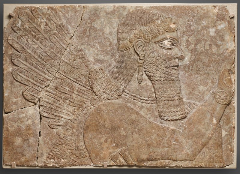 Ancient Assyrian Gate Reliefs With Winged Genies<span class=