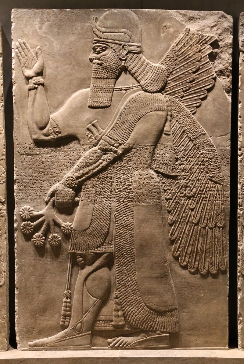 Ancient Assyrian Gate Reliefs With Winged Genies
