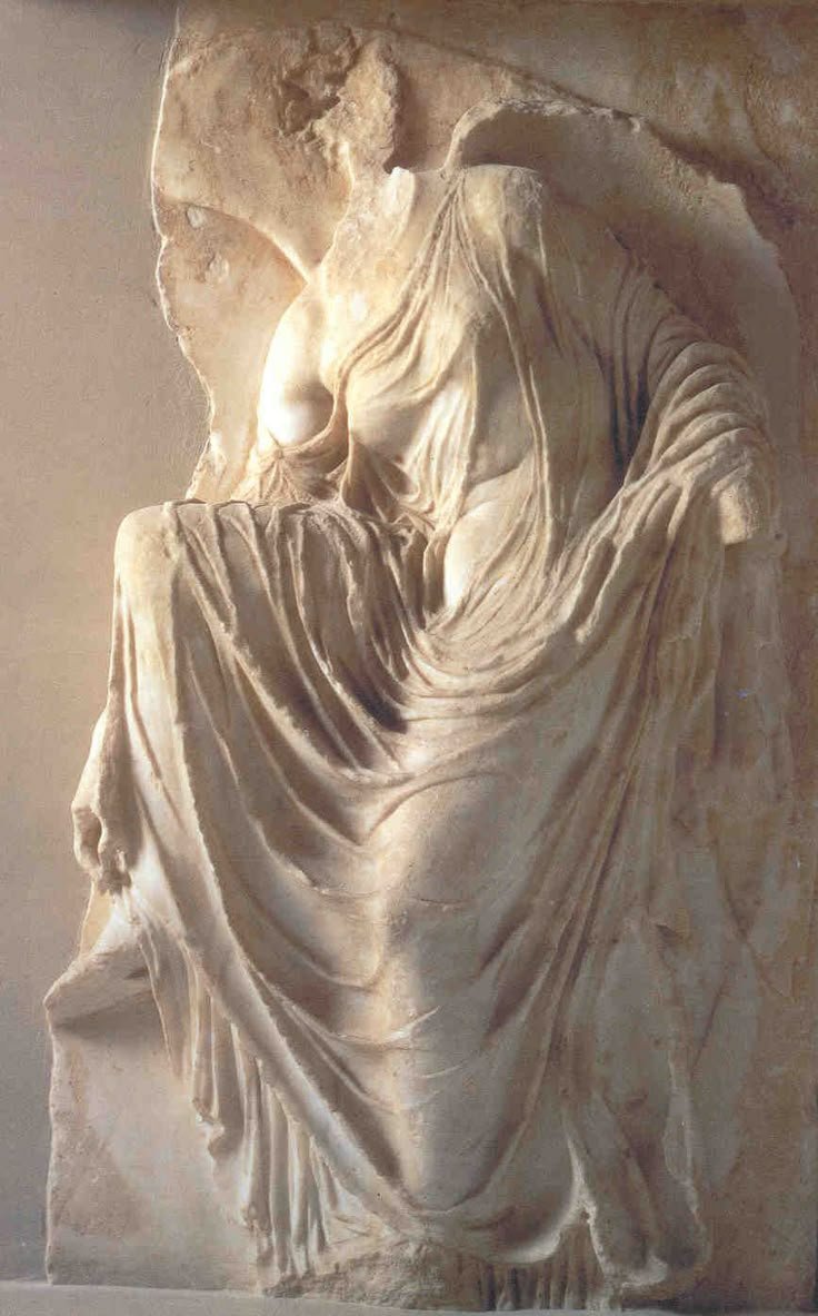 Ancient Greek Relief Of Nike Adjusting Sandal