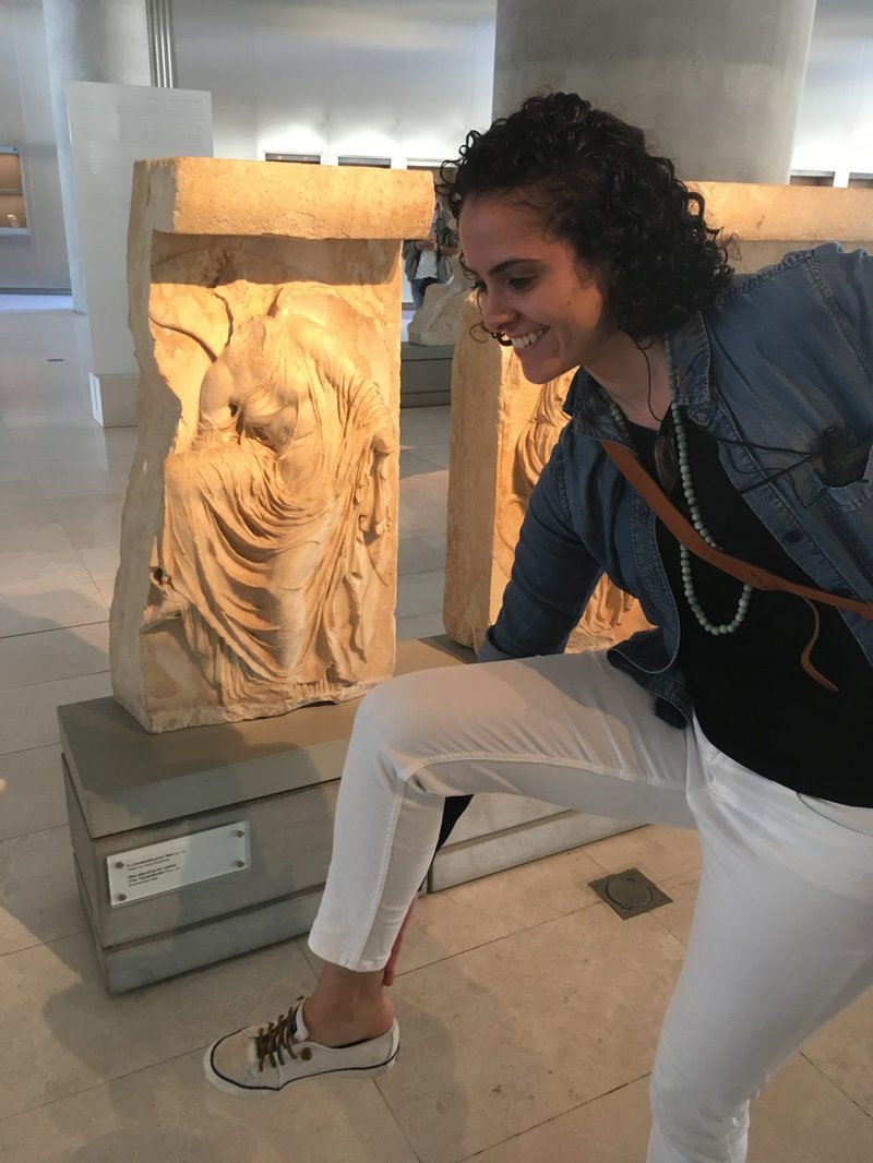 Ancient Greek Relief Of Nike Adjusting Sandal