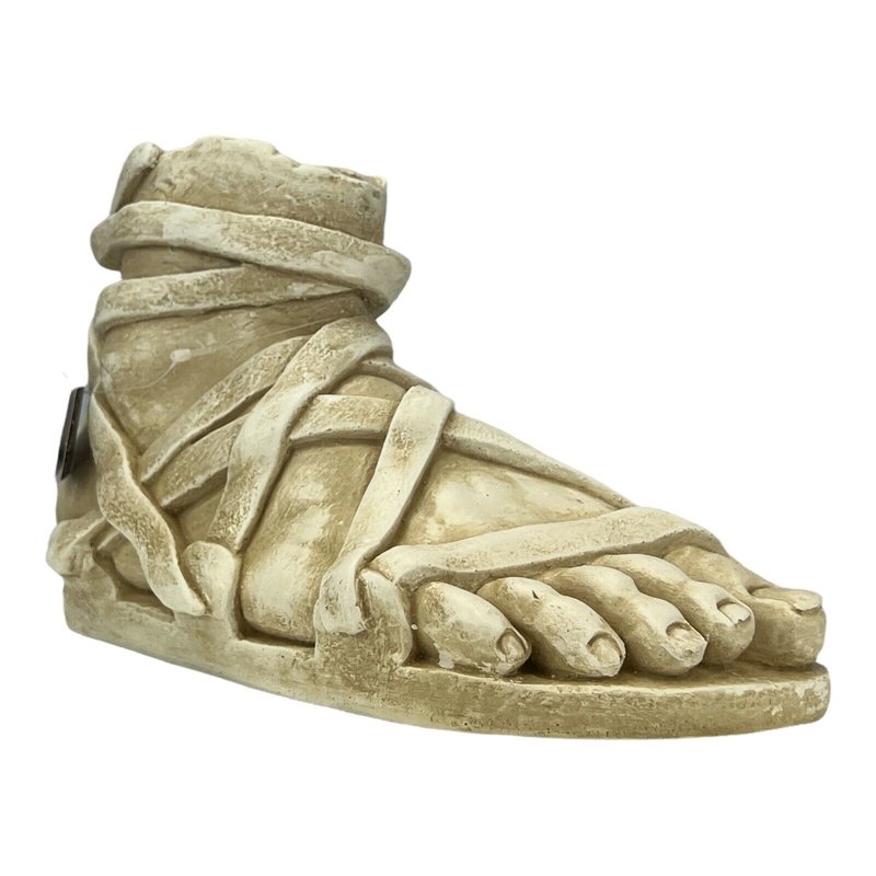 Ancient Greek Relief Of Nike Adjusting Sandal