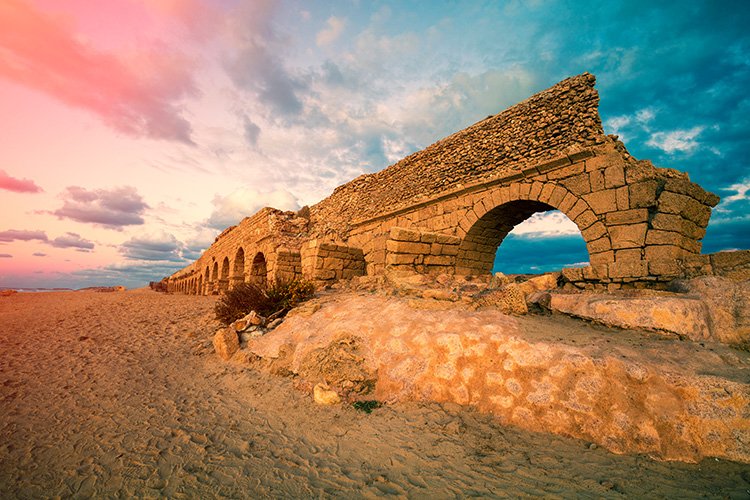 Roman Aqueduct Ruins In Caesarea<span class=
